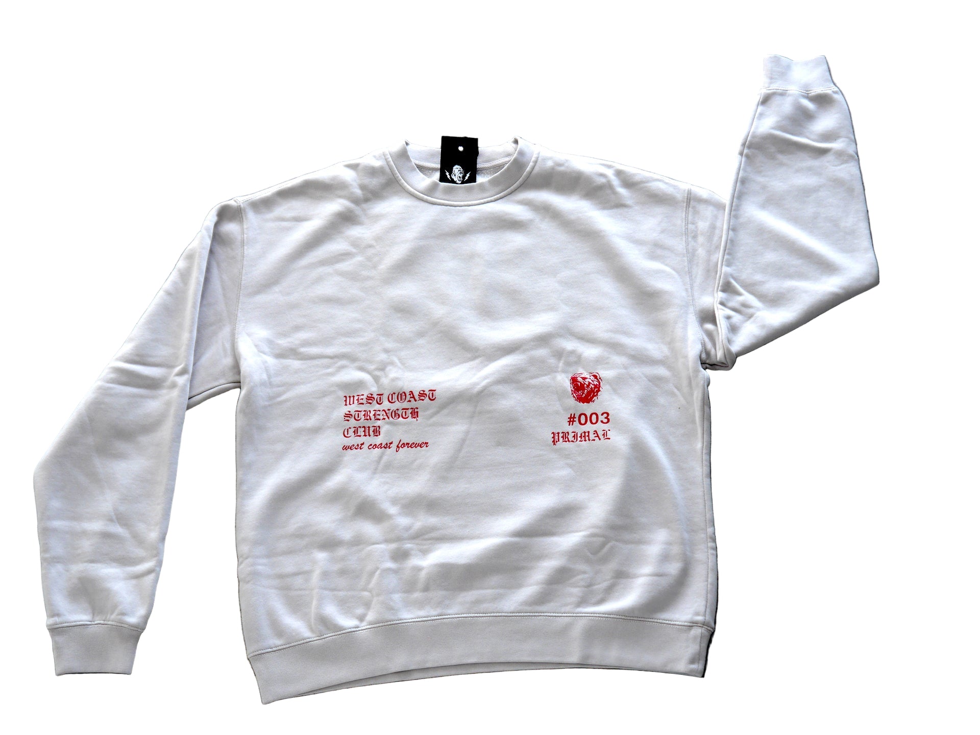 White sweatshirt with red text and graphics on a concrete surface